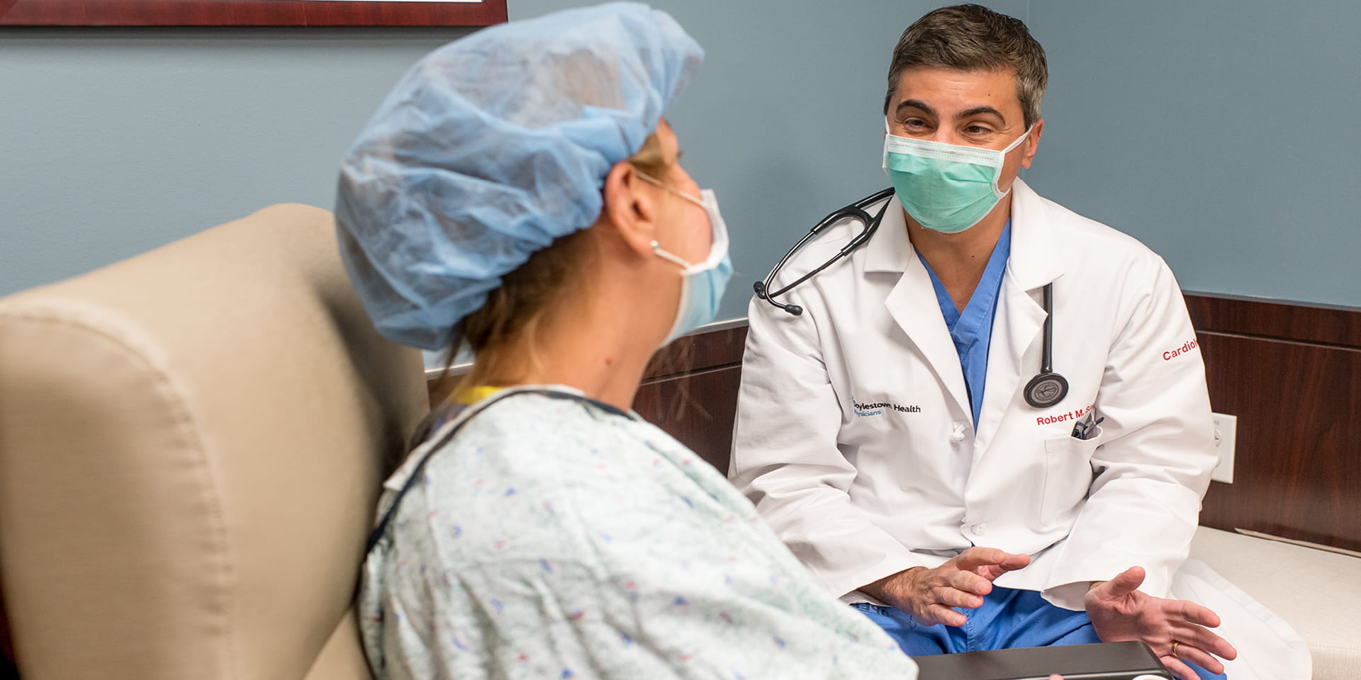 Doctor speaking with patient.