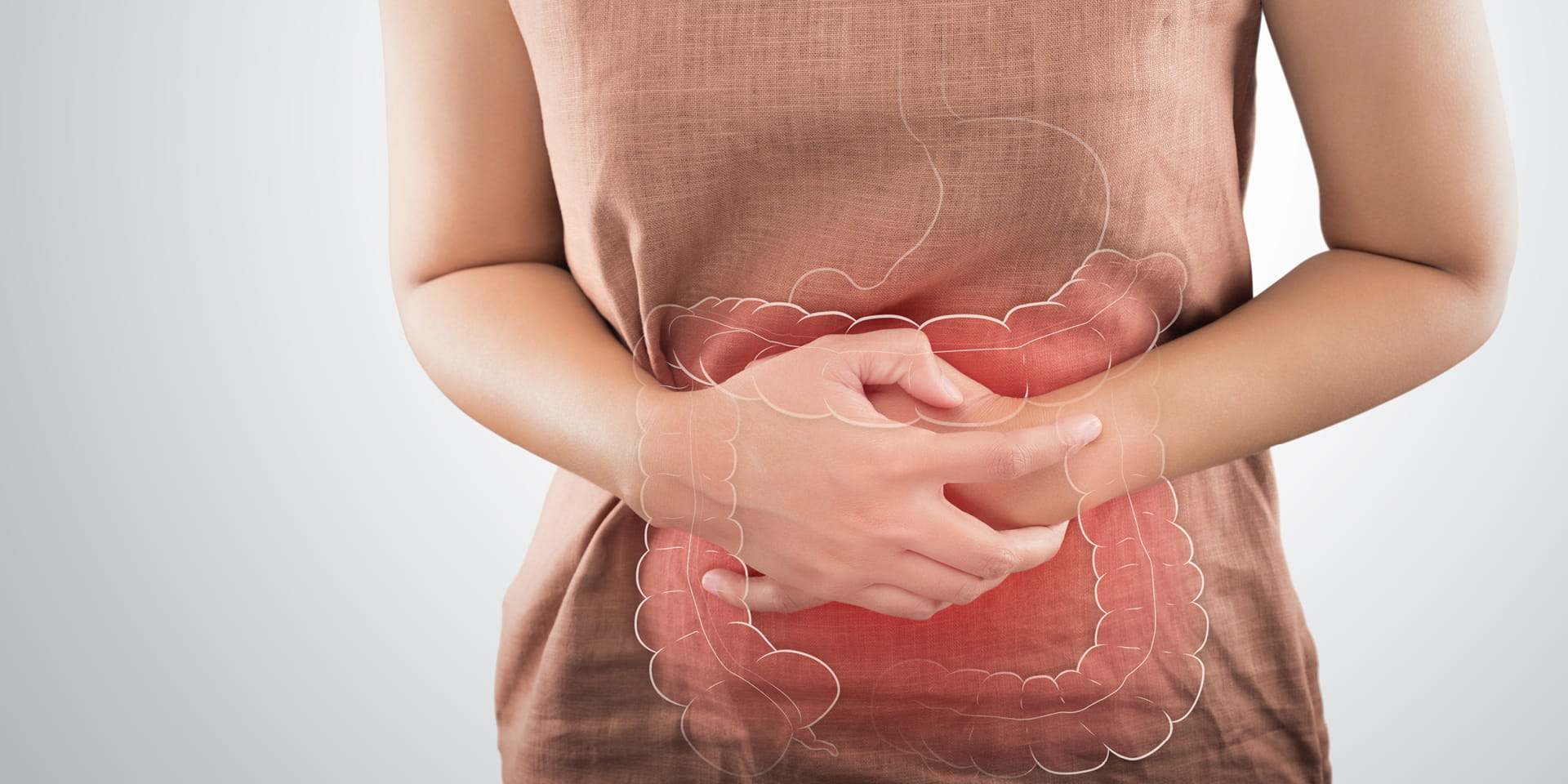 woman clutching stomach