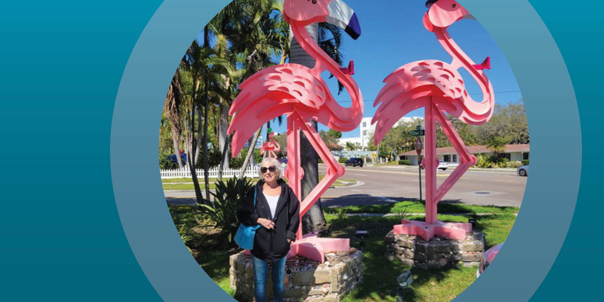 Joan Klein in front of pink flamingos | Doylestown Health