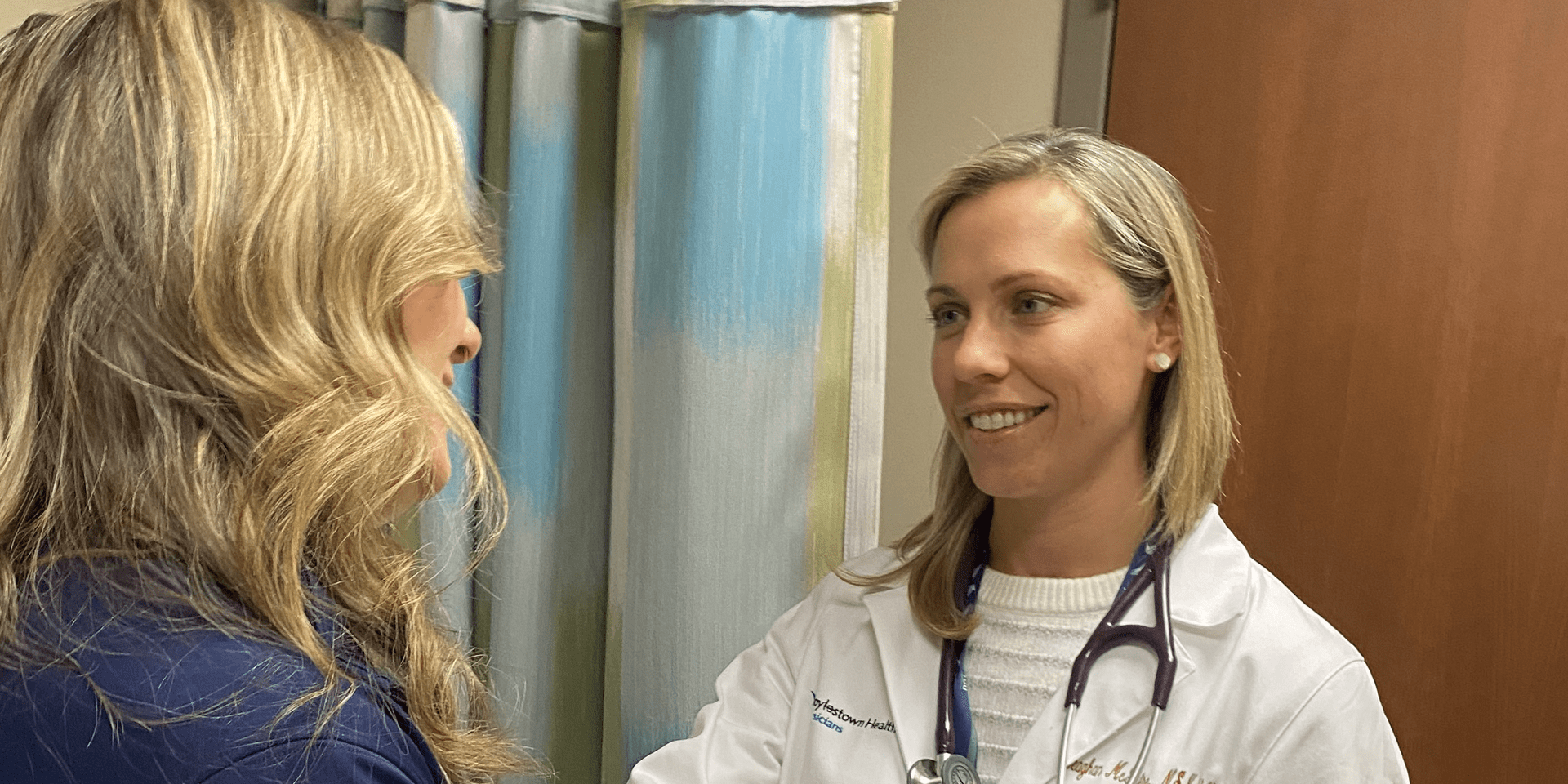 Meaghan McGuire, MSN, CRNP-c with a Cancer Survivor | Doylestown Health