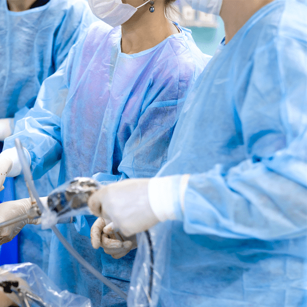 Selective focus on the hands of surgeons operating on a patient with instruments during laparoscopic surgery. Minimally invasive surgery | Doylestown Health