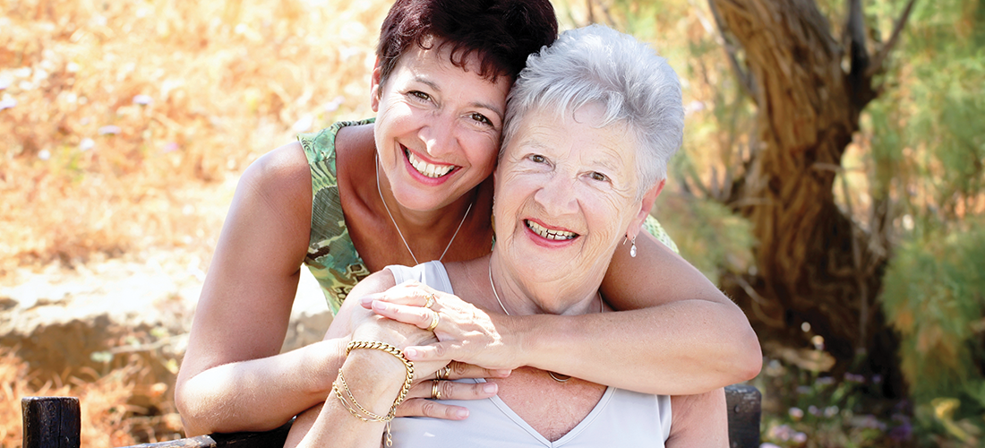 A woman hugging an elderly woman | Doylestown Health