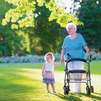 Elderly woman with child in park settings