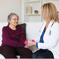 Provider discussing discharge with a patient | Doylestown Health