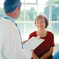 Provider discussing surgery with a patient | Doylestown Health