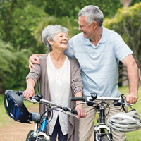 Couple with bicycles | Doylestown Health